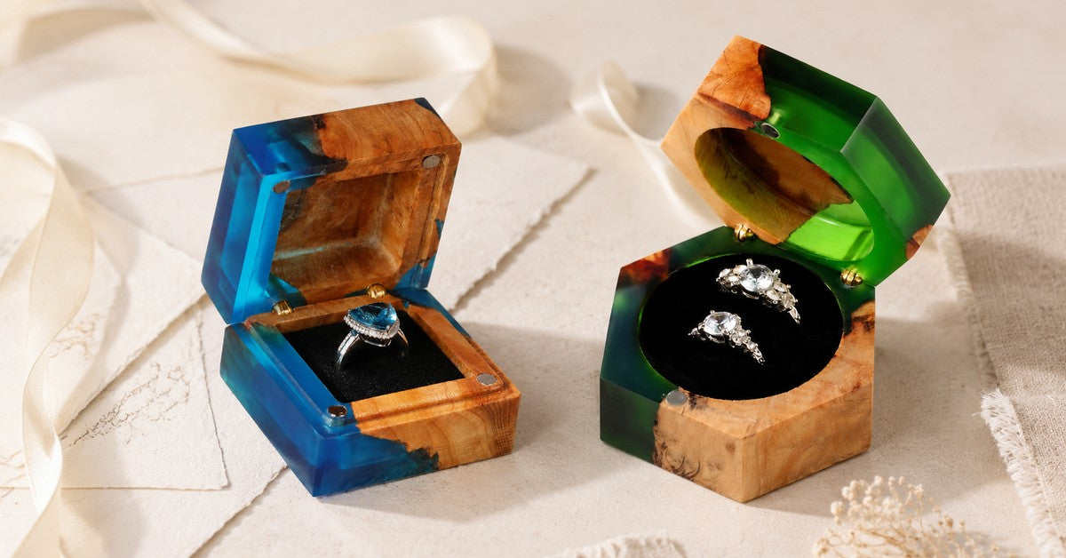 Single blue wood resin ring box and double green wood resin ring box compared for proposal and ceremony planning