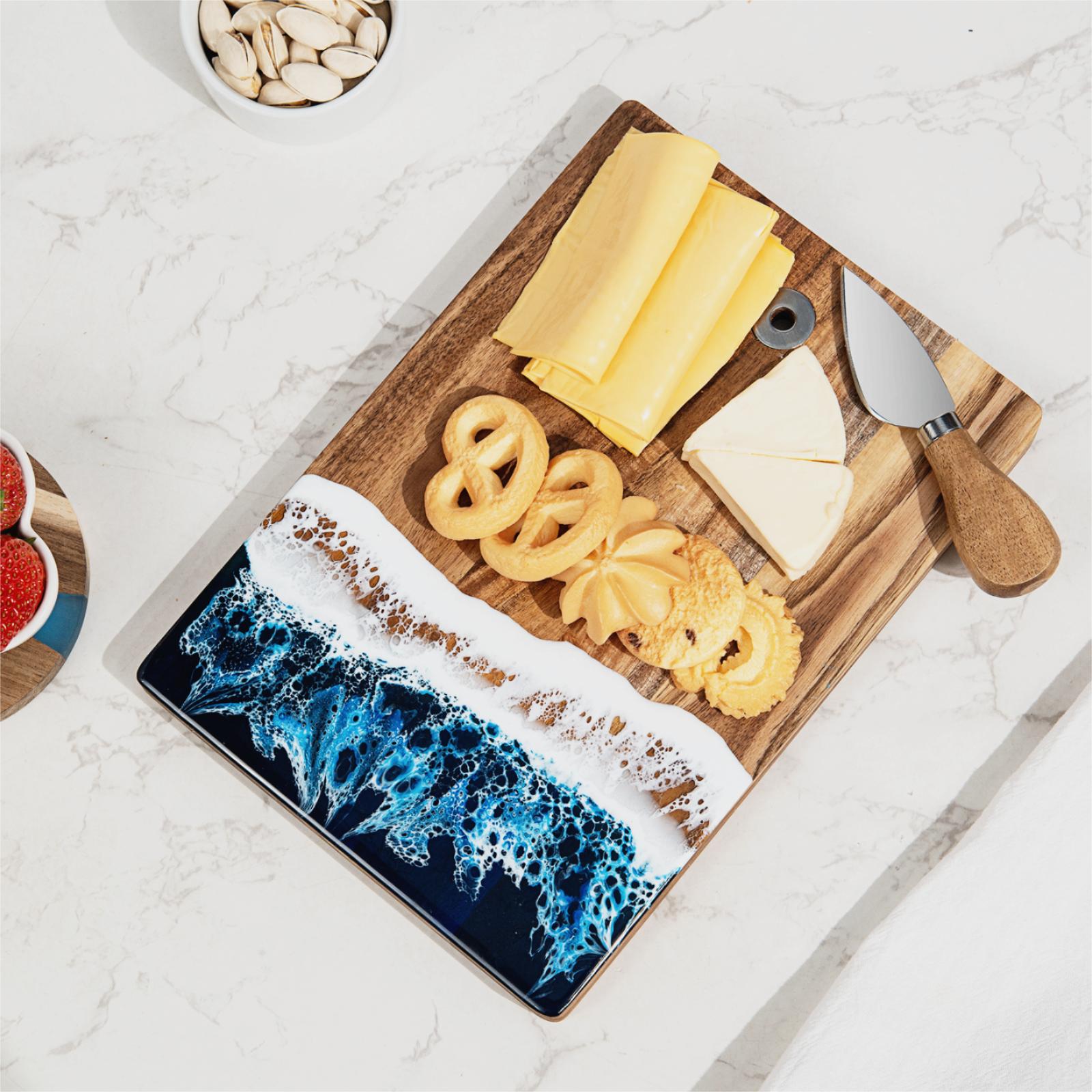 Small acacia wood and epoxy resin cheese board for fruit bread appetizers and compact serving