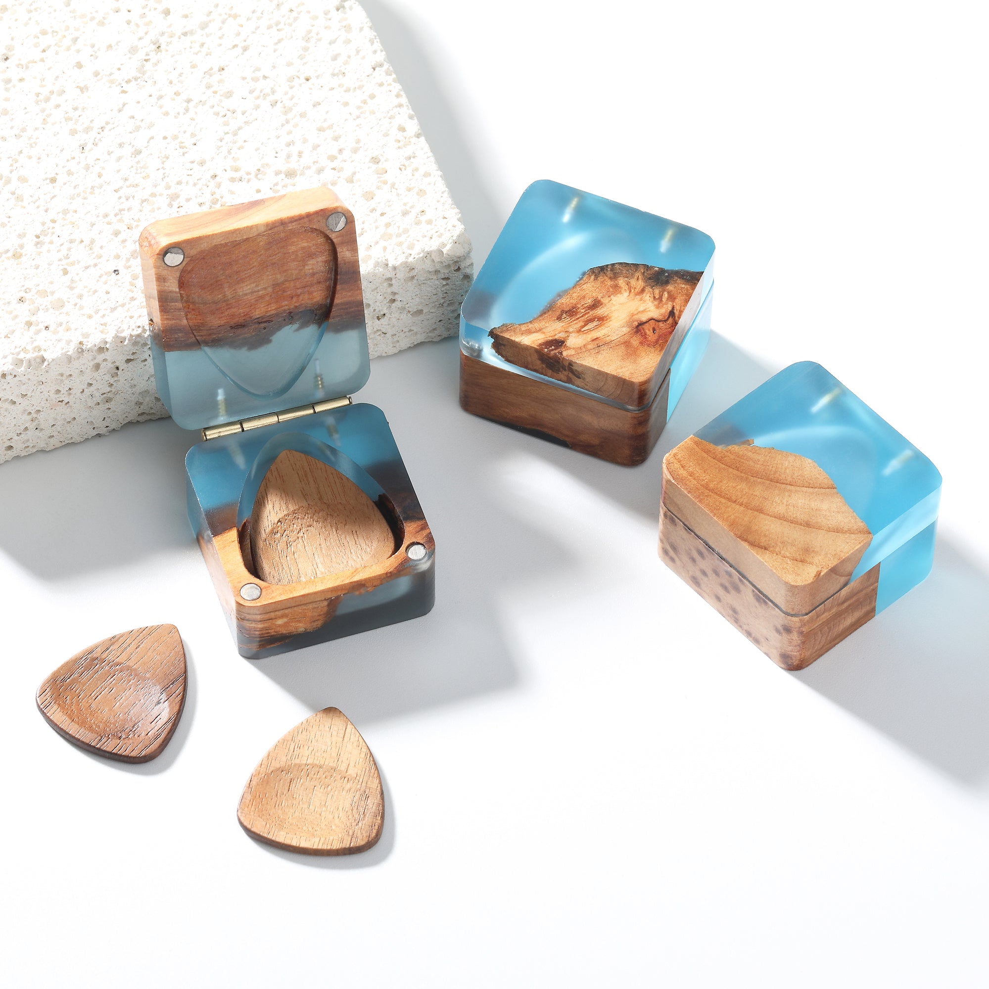 Close-up of epoxy resin wave pattern on acoustic guitar pick holder box