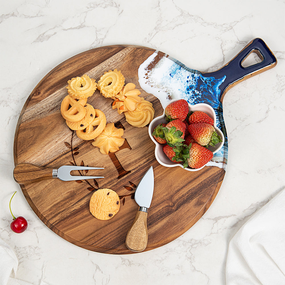 Close-up of custom engraving detail on personalized round resin cutting board